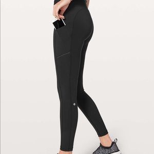 black lululemon reflective speed up leggings
